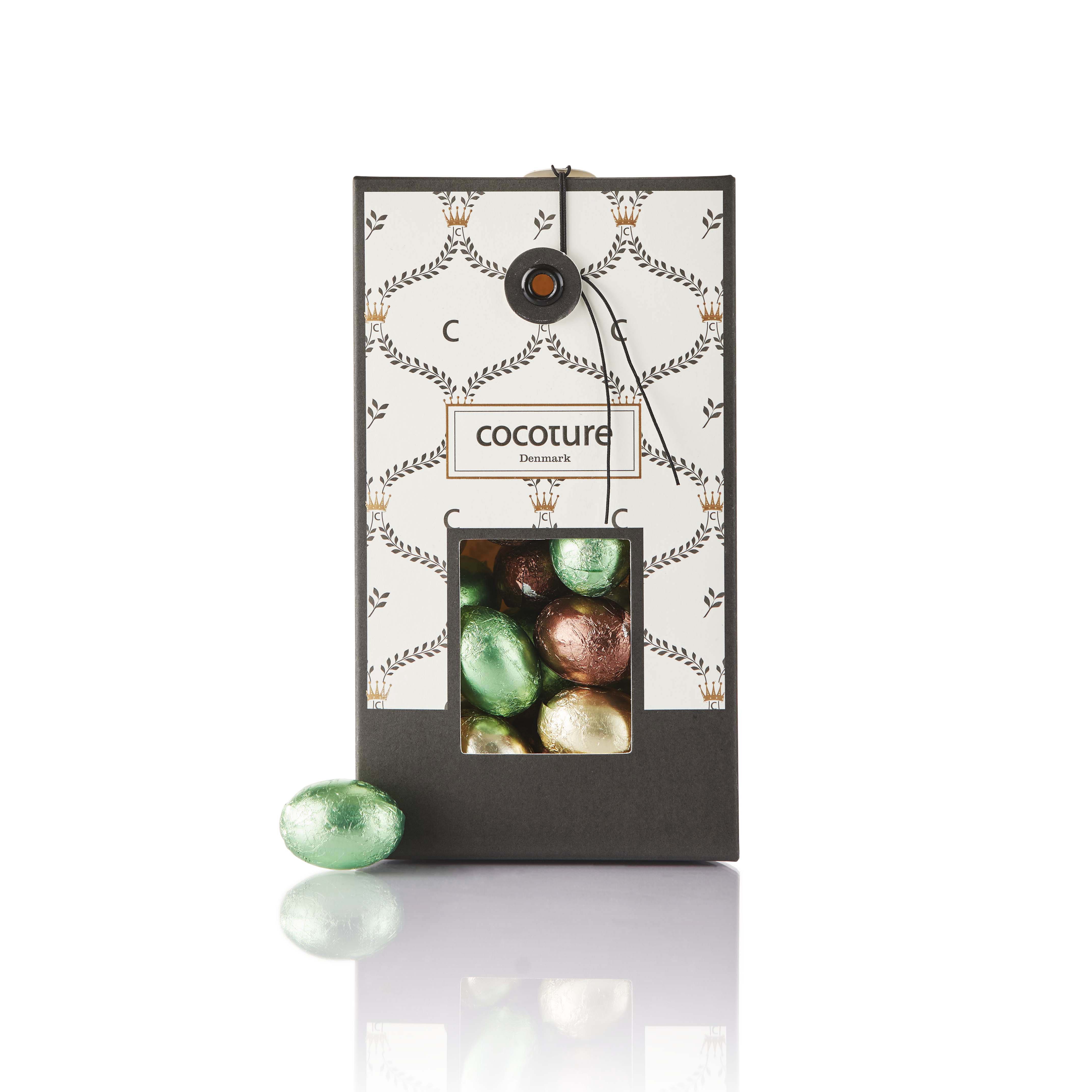 95-100g nougat pralinéæg i Cocoture Palæ dragébox