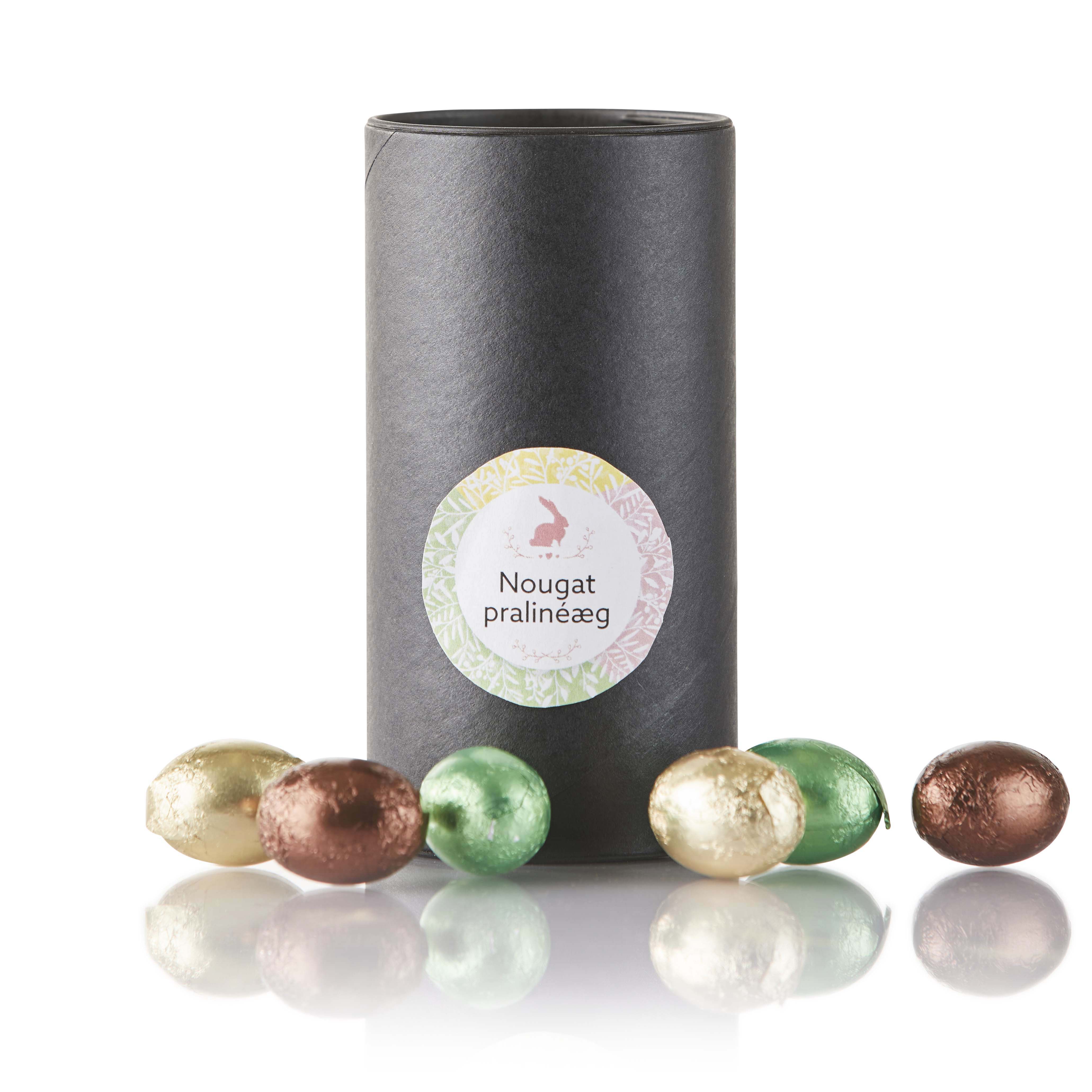 70g nougat pralinéæg i sort rør