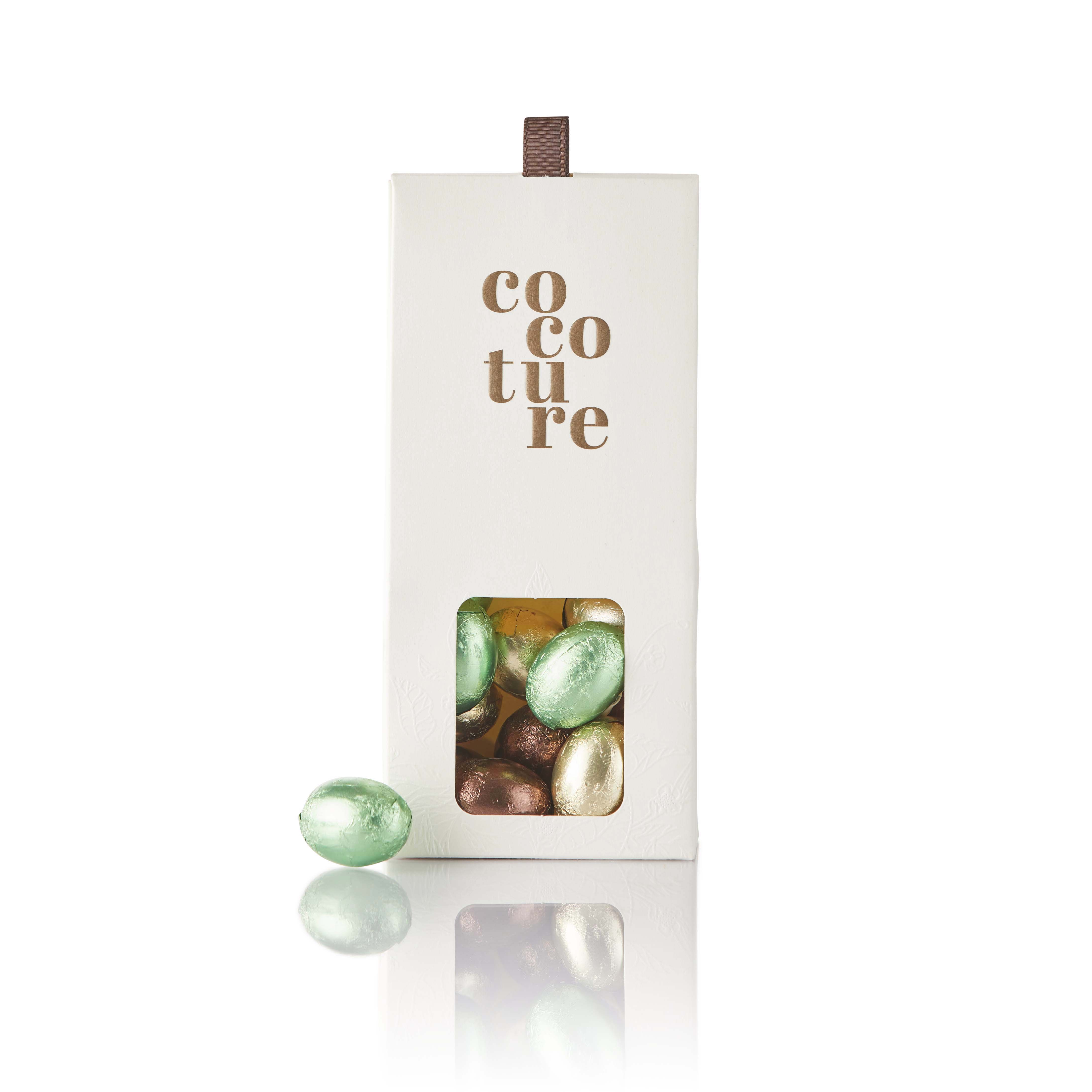 95-100g nougat pralinéæg i hvid Cocoture dragébox